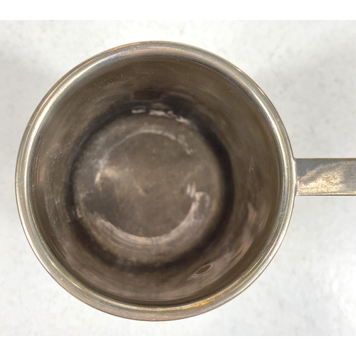 649 - A hallmarked silver 1 pint mug of tapering cylindrical form, on raised foot, Birmingham 1937, 5oz