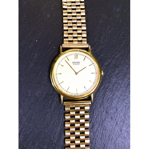 652 - A gent's Seiko gold plated wristwatch on 9 carat gate bracelet strap, 37.5gm gross weight