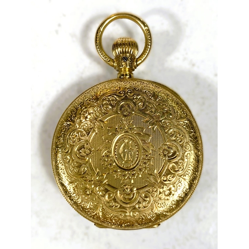 653 - A 18 carat hallmarked gold Waltham pocket watch with extensive chased decoration, keyless and open f... 