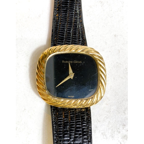 655 - A gent's yellow metal dress wristwatch by Beuche-Girod, stamped 375, with black dial and strap