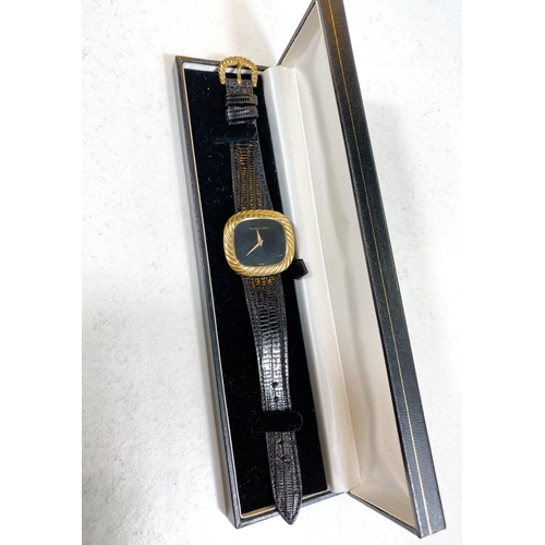 655 - A gent's yellow metal dress wristwatch by Beuche-Girod, stamped 375, with black dial and strap