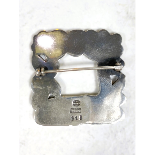 675 - Georg Jensen:  a silver square brooch with doe and squirrel in foliage, stamped Georg Jens... 