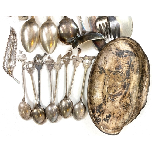 706 - A selection of hallmarked silver napkin rings, tea spoons and various white metal and EPNS items.