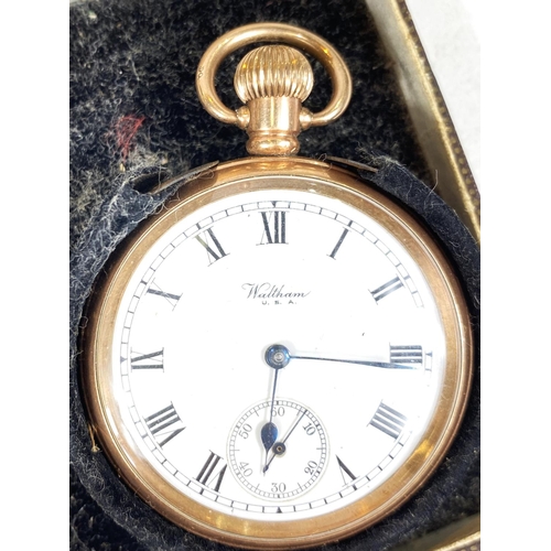 713 - A gold plated Waltham open face pocket watch enamel dial, seconds complication in fitted box and thr... 