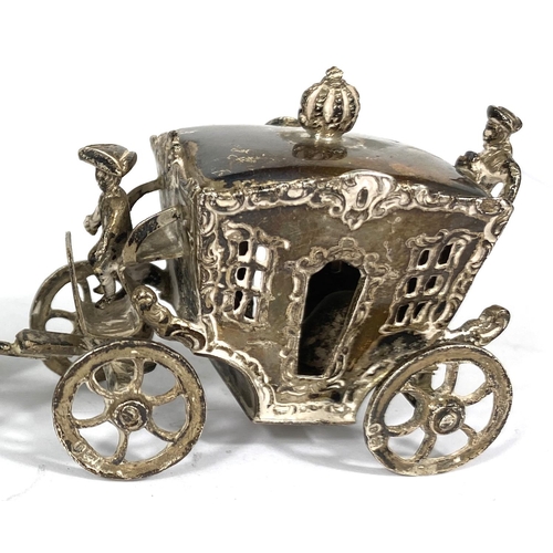 714 - A miniature hall marked silver horse and carriage four horses and two coachmen L 15cm 