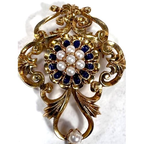 717 - An antique pearl and blue enamel pendant/brooch with central 7 pearl cluster surrounded by blue enam... 