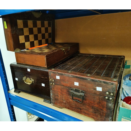 72 - A carved chess set with carved wooden figures, a wooden box and a cutlery box with collectables