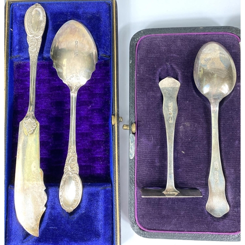 724 - A hallmarked silver preserve spoon and butter knife, cased, Sheffield 1904; a hallmarked silver chri... 