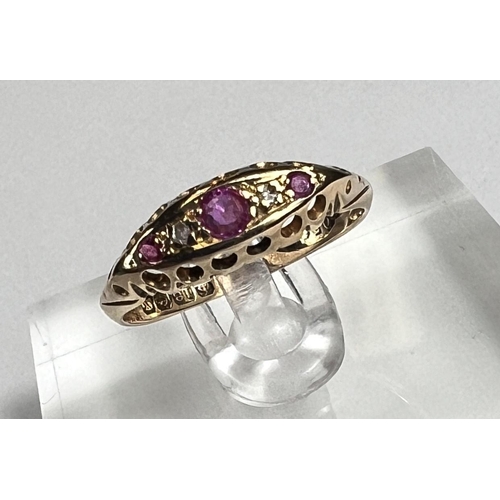 729 - An 18ct hallmarked gold 'gypsy' style lady's dress ring set with 3 rubies and 2 small diamonds, 1.8g... 