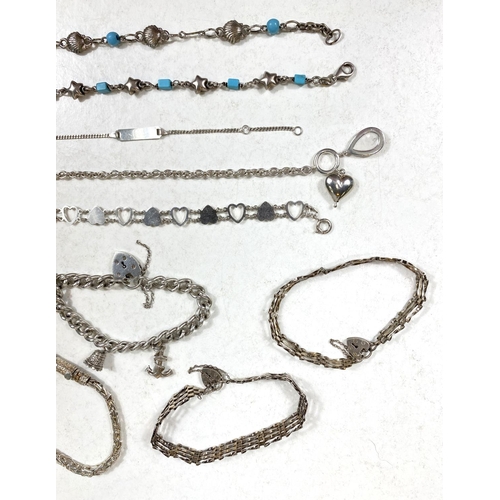 729A - A selection of silver/white metal chain and gate bracelets, 95gm