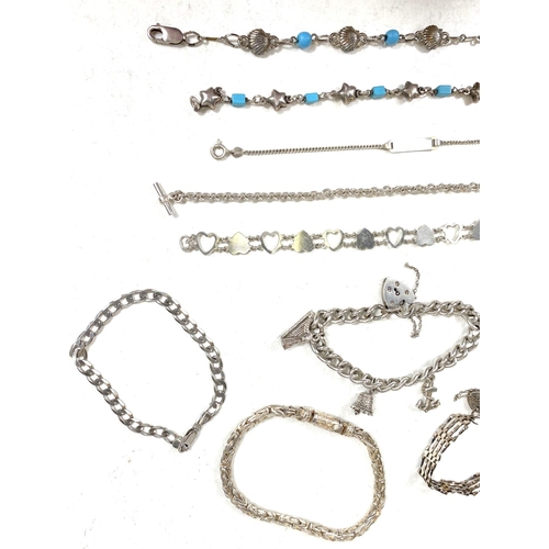 729A - A selection of silver/white metal chain and gate bracelets, 95gm