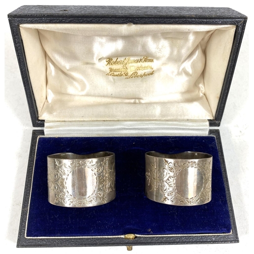 732A - A pair of hallmarked silver napkin rings, boxed, another, boxed, 46.6gm (15oz); a hallmarked silver ... 