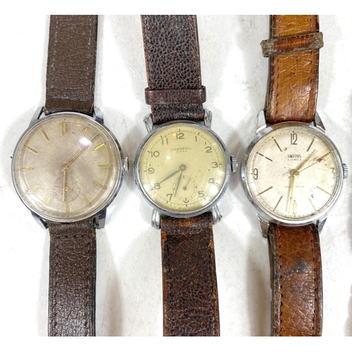 733A - A vintage Smiths gents watch, an Ingersoll gents watch, another and a part sterling silver watch str... 