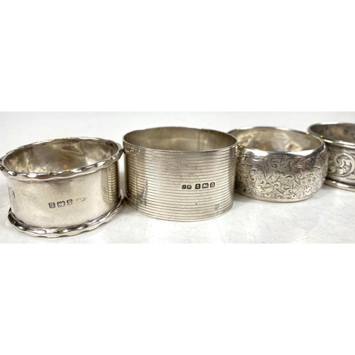 733B - 8 hallmarked silver napkin rings, various designs, dates and assay offices, 102gm