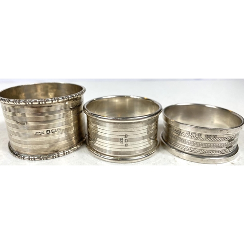 733B - 8 hallmarked silver napkin rings, various designs, dates and assay offices, 102gm