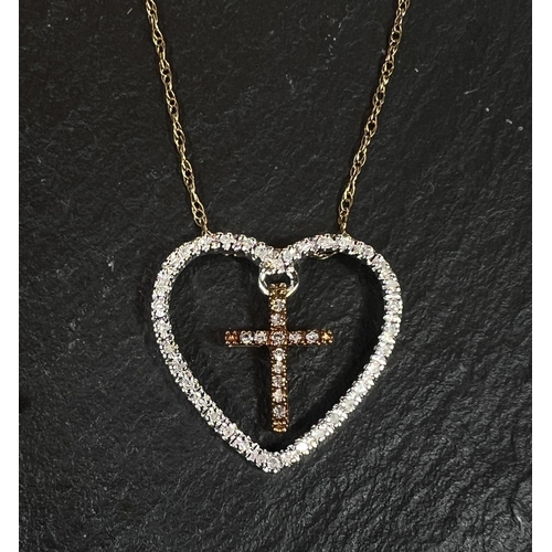 752 - A 9 carat gold cross pendant; a chain stamped 375; another 9 carat pendant, 6.6gms gross.