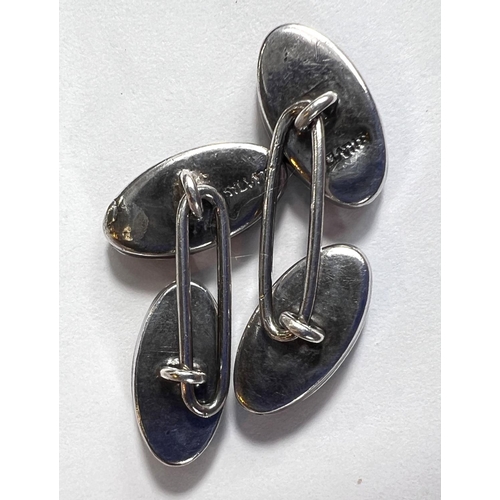 757 - A pair of white metal cufflinks, stamped 'silver', jet with elongated oval Blue John stones, 5.7gms.