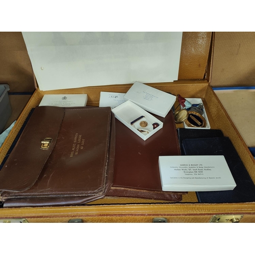 76 - Two suitcases of Masonic aprons, regalia, jewels etc, some silver examples