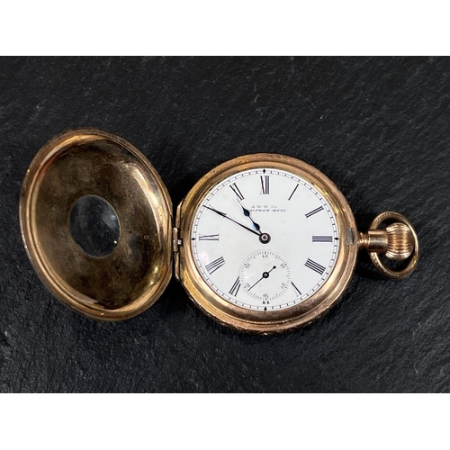 767B - An Edwardian keyless half hunter pocket watch by AWW Waltham with extensively chased case.