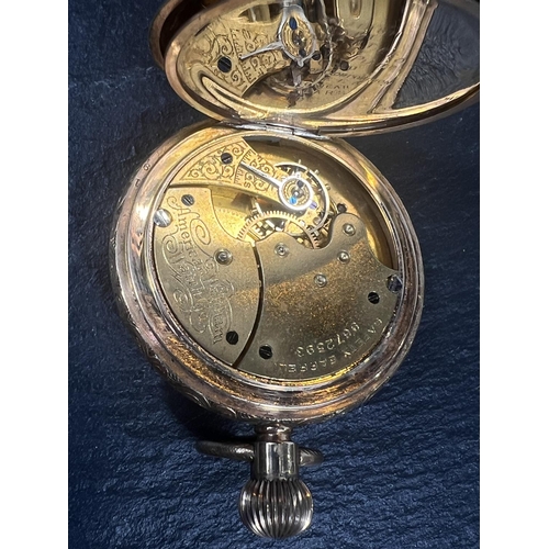 767B - An Edwardian keyless half hunter pocket watch by AWW Waltham with extensively chased case.