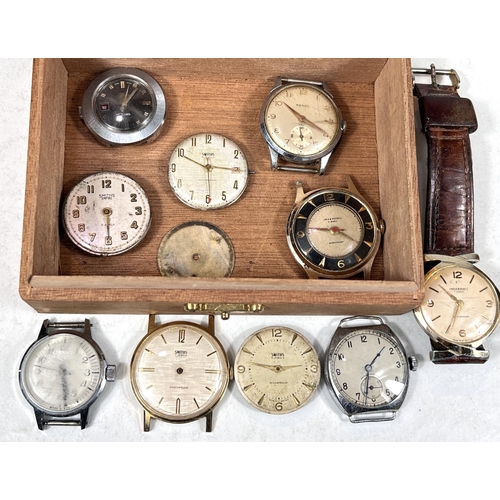 776A - A small box containing a variety of wristwatches (only one with strap).