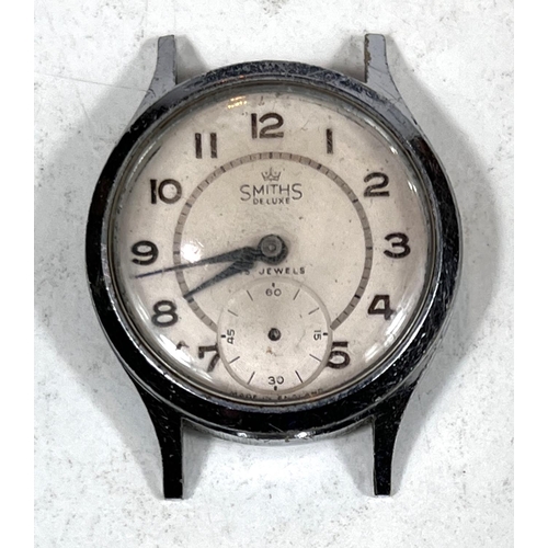 777A - A Smiths Delux Wristwatch, and a Smiths Empire Wristwatch with a cream and brown face (no strap to e... 