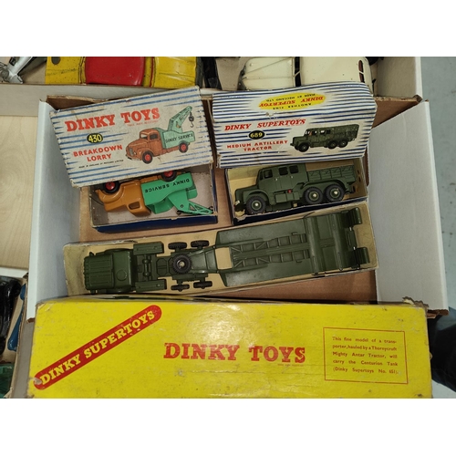 298 - Dinky Toys: Three boxed Dinky vehicles, 430 Breakdown Lorry, 689 and a Miliary Transport