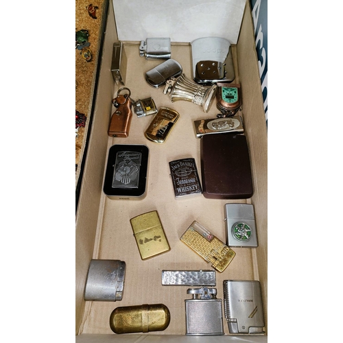 93 - A Harley-Davidson cased zippo lighter, a jack Daniels zippo lighter and a collection of lighters