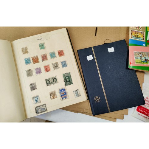 51 - Two albums and a stockbook containing a collection of stamps
