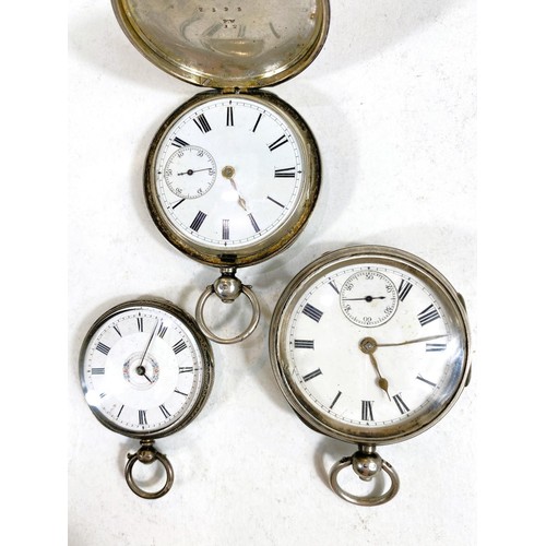 613 - A silver cased hunter pocket watch (a.f.), another pocket watch and a lady's continental fob watch