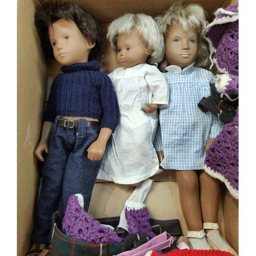 299A - Three Mid 20th century Sasha dolls, two girls and one boy with extra clothing