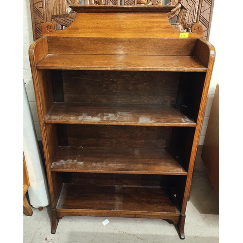 934 - An Arts & Crafts oak 4 height bookcase; a pine cabinet enclosed by 2 doors; an oak 4 drawer low ... 