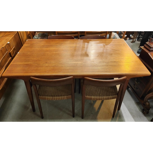 936 - A 1960's/70's teak dining suite by J L Moller, Denmark, comprising extending rectangular table and 4... 