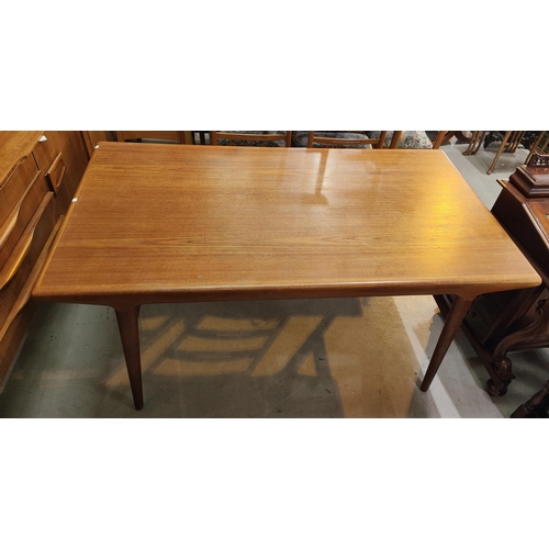 936 - A 1960's/70's teak dining suite by J L Moller, Denmark, comprising extending rectangular table and 4... 