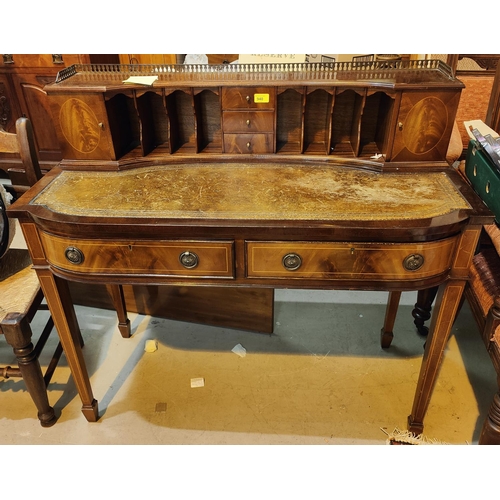 940 - A reproduction inlaid mahogany desk in the Carlton House style