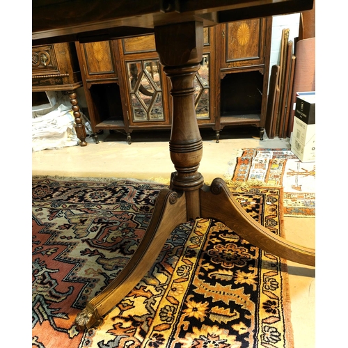 941 - A Regency style mahogany dining suite comprising extending twin pedestal table and 8 (7+ 1) chairs