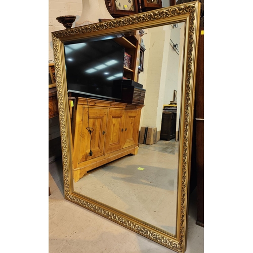 948 - A large rectangular wall mirror in gilt frame; 5 other mirrors