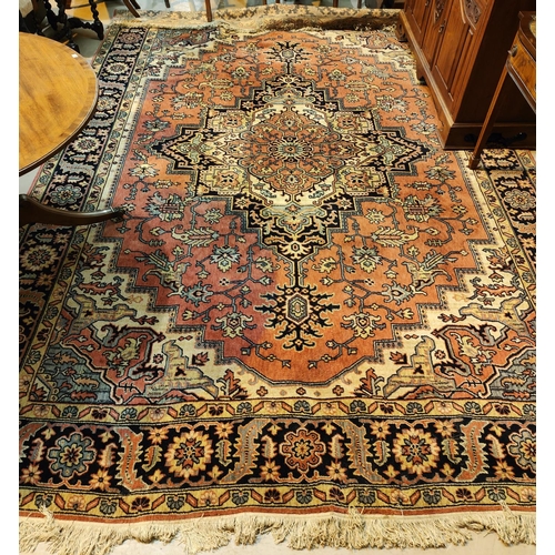 949 - A Persian machine made carpet square