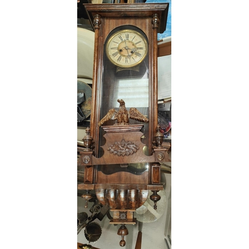 43 - An early 20th century Vienna wall clock and two Napoleon cased mantel clocks