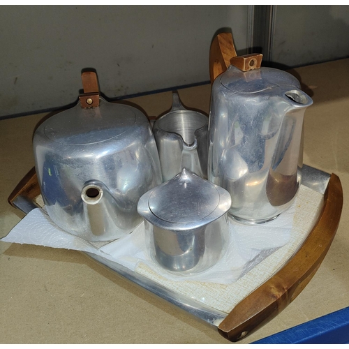 58A - A vintage stainless steel Picquot 5 piece tea set, including tray.