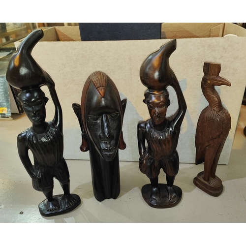 75C - A group of four carved African figures various forms