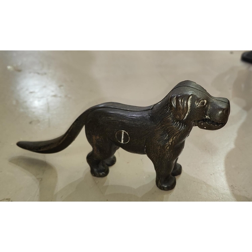 75D - A cast metal nut cracker in the form of a dog