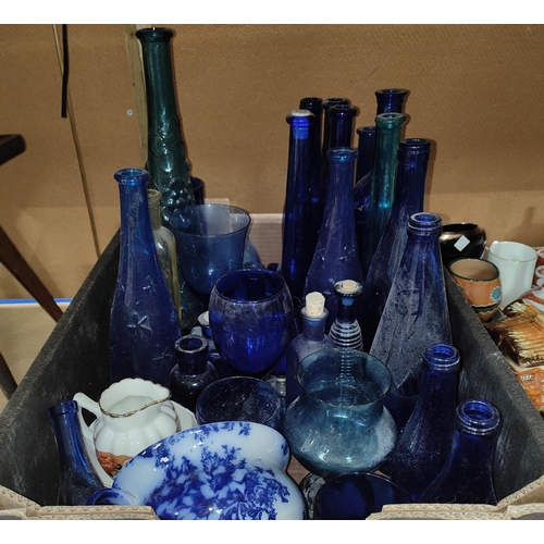 86A - A collection of coloured bottles mainly Bristol blue etc