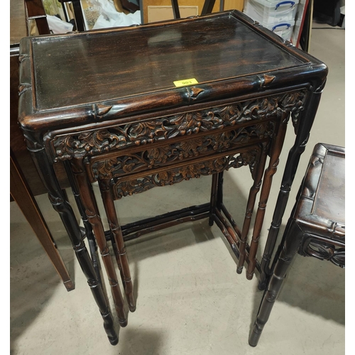 903 - A nest of 3 Chinese hardwood  tables with carved and pierced friezes, 51 x 37 x 73 cm high maxi... 