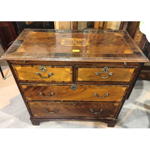 923 - A Georgian mahogany bachelor's chest of 2 long and 2 short drawers with wide rosewood crossbanding a... 