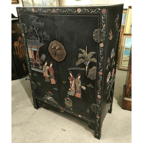 980 - A Chinese black cabinet with coloured floral and bird decoration 