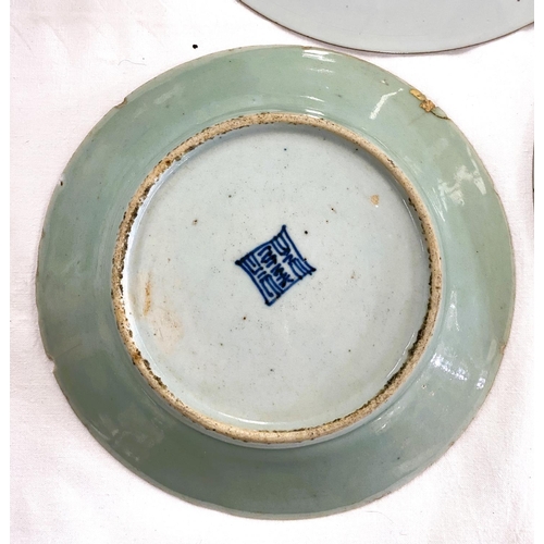 524D - Three Chinese dishes, celadon, blue and white and another stapled (some damage)