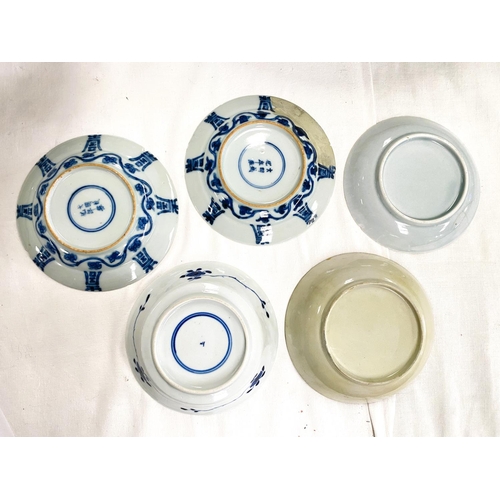 524F - Five various small Chinese blue and white dishes, dia. 13cm, some damage and restoration