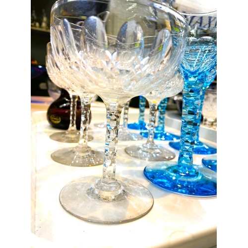 588 - A set of 5 late 19th century, early 20th century light blue slice cut stemmed glasses, 6 coupe glass... 