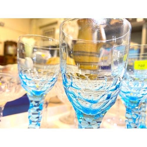 588 - A set of 5 late 19th century, early 20th century light blue slice cut stemmed glasses, 6 coupe glass... 